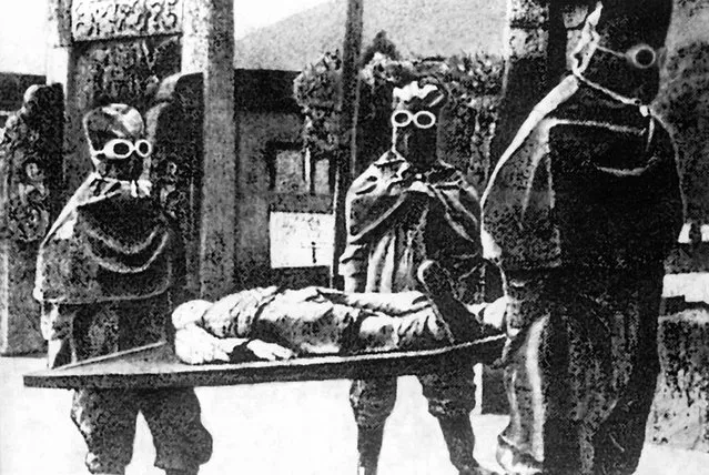 Japanese staff carrying a corpse at Unit 731 in Northeast China, date unknown. Unit 731 was a covert biological and chemical warfare research and development unit of the Imperial Japanese Army that undertook lethal human experimentation during the Second Sino-Japanese War (1937-1945) and World War II. It was responsible for some of the most notorious war crimes carried out by Japanese personnel. Unit 731 was the code name of an Imperial Japanese Army unit officially known as the Epidemic Prevention and Water Purification Department of the Kwantung Army. It was initially set up under the Kempeitai military police of the Empire of Japan to develop weapons of mass destruction for potential use against Chinese, and possibly Soviet forces. (Photo by: Pictures From History/Universal Images Group via Getty Images)