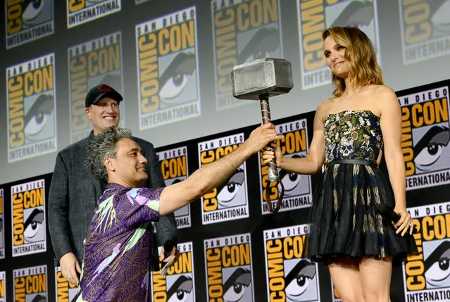 (L-R) Kevin Feige, Taika Waititi and Natalie Portman speak at the Marvel Studios Panel during 2019 Comic-Con International at San Diego Convention Center on July 20, 2019 in San Diego, California. (Photo by Albert L. Ortega/Getty Images)
