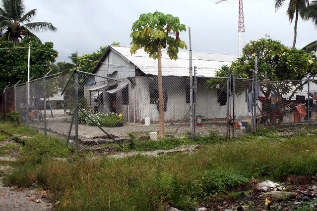 A fence surrounds a prison on Kiritimati Island, part of the Pacific Island nation of Kiribati, April 5, 2016. (Photo by Lincoln Feast/Reuters)