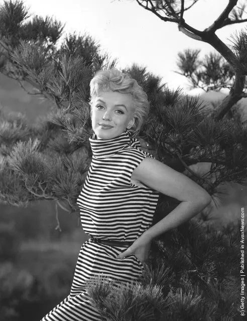 Getty Images Gallery - Marilyn Monroe at her home in Palm Springs,  California, during a photo shoot with Baron in 1954. Continuing our  #Modernismweek appreciation, our next Palm Springs stop is the