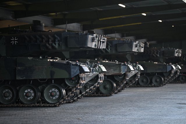 Leopard 2 tanks destined for Ukraine delivery stand parked at the training ground in Augustdorf, western Germany on February 1, 2023, during a visit of the German Defence Minister of the Bundeswehr Tank Battalion 203, to learn about the performance of the Leopard 2 main battle tank. (Photo by Ina Fassbender/AFP Photo)