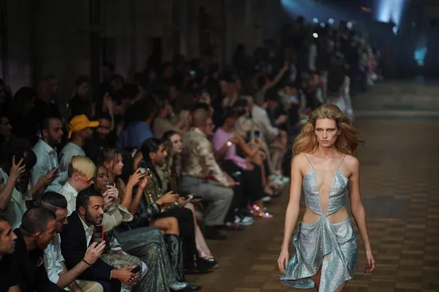 A model presents a creation during the Julien Macdonald catwalk show at London Fashion Week in London, Britain, September 16, 2019. (Photo by Henry Nicholls/Reuters)