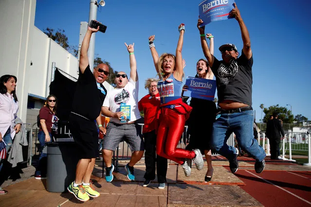 Supporters jump for a friend's photo as they wait for U.S. Democratic presidential candidate Bernie Sanders to speak in Santa Monica, California, U.S. May 23, 2016. (Photo by Lucy Nicholson/Reuters)