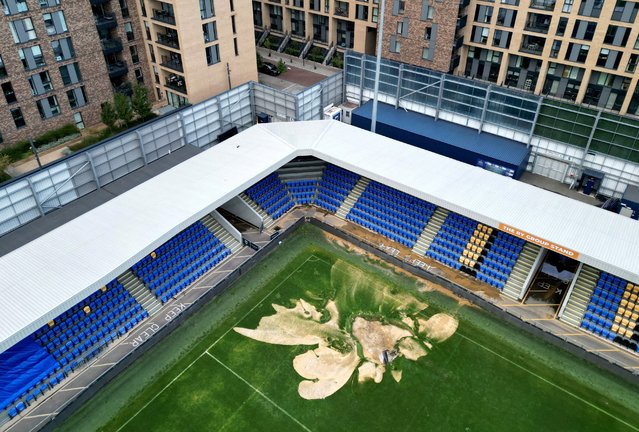 A drone view of a sink hole caused by heavy rainfall at the Cherry Red Records Stadium, home of AFC Wimbledon football club in London, Britain on September 23, 2024. (Photo by Hannah McKay/Reuters)