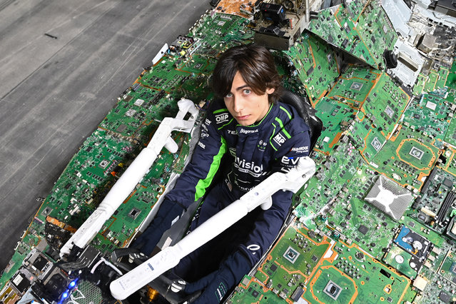 Aidan Gallagher inside the drivers seat of the Recover E Car, a full scale working model of a Formula E race car made entirely from electronic waste created to raise awareness of the growing issue of e waste and to encourage people to consider repairing and recycling their unwanted electronic items at ExCel London on July 27, 2023 in London, England. (Photo by Kate Green/Getty Images)