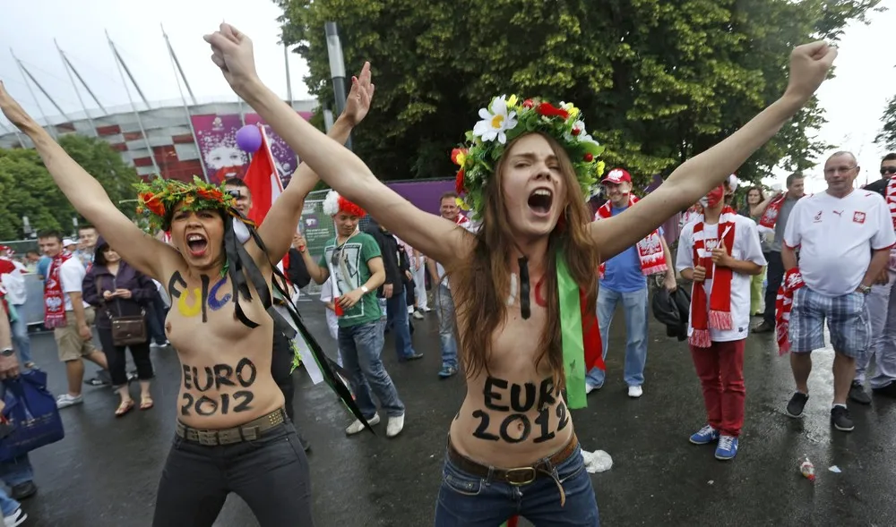 FEMEN Activists Strip In Protest Against EURO 2012