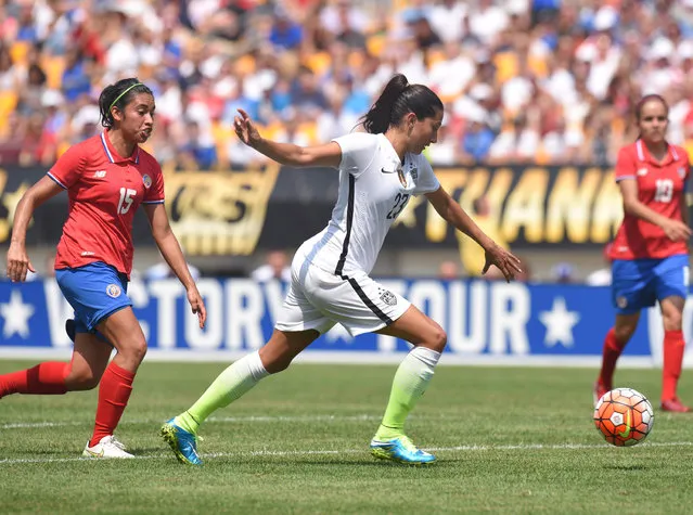 United States forward Christen Press (23) beats Costa Rica midfielder Cristin Granados (15) to score a goal during the first half of a women's friendly soccer match on Sunday, August 16, 2015, in Pittsburgh. (Photo by Don Wright/AP Photo)