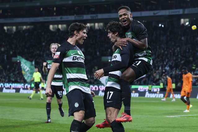 Sporting player Francisco Trincao (C) celebrates after scoring the 2-1 during the Portuguese First League soccer match between Sporting and Boavista at Alvalade Stadium in Lisbon, Portugal, 14 December 2024. (Photo by Jose Sena Goulao/LUSA)