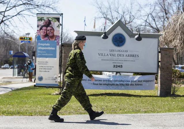Canadian Armed Forces (CAF) medical personnel arrive at Villa Val des Arbres, a seniors' long-term care centre, to help amid the outbreak of the coronavirus disease (COVID-19), in Montreal, Quebec, Canada on April 20, 2020. (Photo by Christinne Muschi/Reuters)