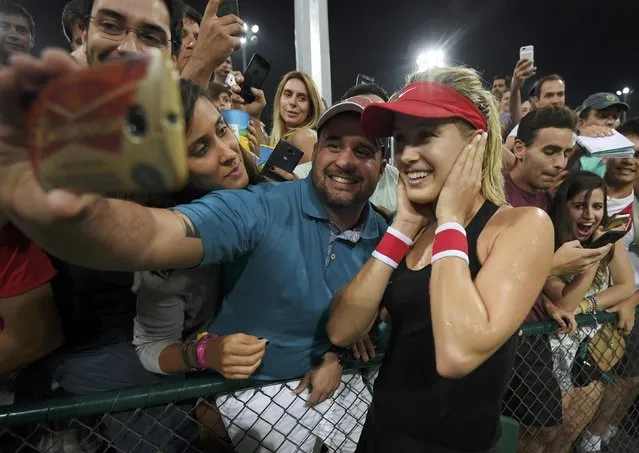 2016 Rio Olympics, Tennis, Preliminary, Women's Singles First Round, Olympic Tennis Centre, Rio de Janeiro, Brazil on August 6, 2016. Eugenie Bouchard (CAN) of Canada takes a selfie with spectators after winning her match against Sloane Stephens (USA) of USA. (Photo by Toby Melville/Reuters)