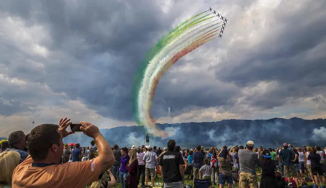 The squad of Frecce Tricolori from the Italian Airforce performs during the Airshow “Airpower 16” on September 2, 2016, in Zeltweg, Austria. (Photo by Erwin Scheriau/AFP Photo/APA)