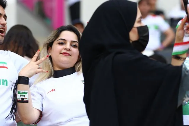 An Iran fan is pictured wearing a 'Women Life Freedom' sticker on their arm prior to the FIFA World Cup Qatar 2022 Group B match between Wales and IR Iran at Ahmad Bin Ali Stadium on November 25, 2022 in Doha, Qatar. (Photo by Hannah Mckay/Reuters)