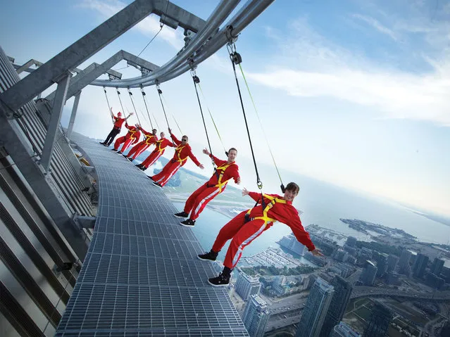 On November 8, 2011 EdgeWalk at the CN Tower was presented with the Guinness World Record for the “Highest External Walk on a Building”. Carey Low, the Guinness World Records' Canadian Representative, presented the certificate to Jack Robinson, Chief Operating Officer of the CN Tower on the EdgeWalk itself, 356m/1,168ft above the ground. (Photo by CNW Group/CN Tower)