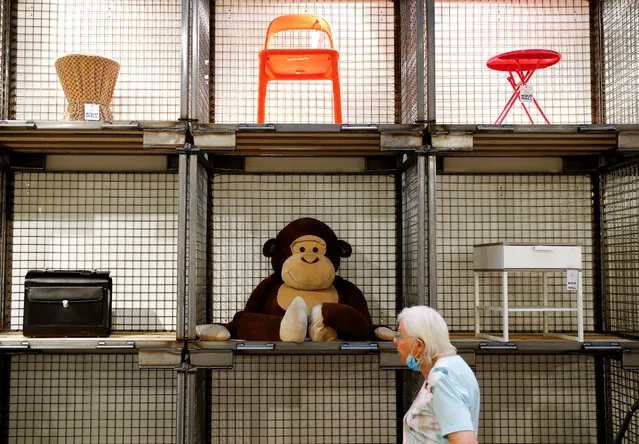 A customer is pictured at Berlin's waste management arm BSR (Berliner Stadtreinigung) second-hand store “Nochmall”, which reads once again, which is selling goods that consumers have tossed as trash but that may be someone else's treasure, in Berlin, Germany, August 14, 2020. (Photo by Fabrizio Bensch/Reuters)