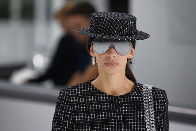 A model presents a creation by German designer Karl Lagerfeld as part of his Spring/Summer 2016 women's ready-to-wear collection for fashion house Chanel at the Grand Palais which is transformed into a Chanel airport during Fashion Week in Paris, France, October 6, 2015. (Photo by Benoit Tessier/Reuters)