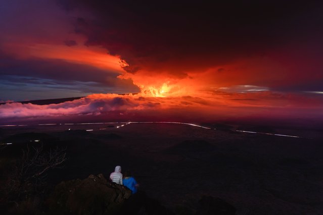 The Big Island's Mauna Loa Volcano erupts on November 28, 2022 on the Island of Hawaii. For the first time in almost 40 years, the biggest active volcano in the world erupted prompting an emergency response on the Big Island. (Photo by Andrew Richard Hara/Getty Images)