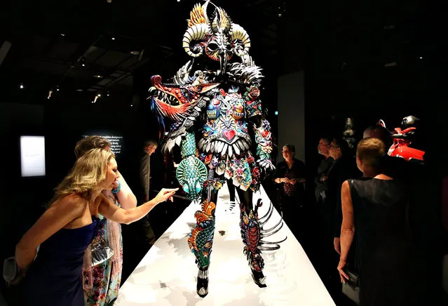 Guests look at the exhibits on show at the Auckland War Memorial Museum's World of Wearable Art (WOW) exhibition opening at Auckland Museum on November 20, 2014 in Auckland, New Zealand. (Photo by Michael Bradley/Getty Images for Auckland War Memorial Museum)