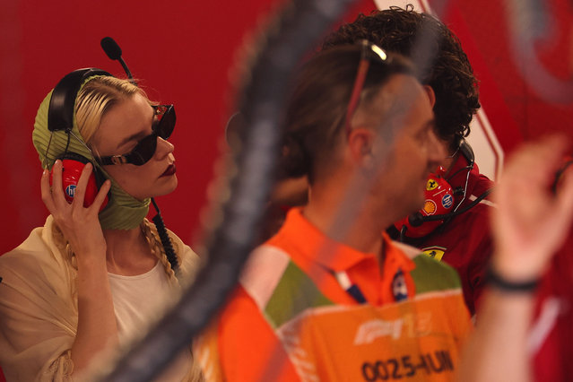 Actress Anya Taylor-Joy watches the qualification at the Scuderia Ferrari garage during the Formula One Hungarian Grand Prix at the Hungaroring racetrack in Mogyorod near Budapest, Hungary, 02 August 2025. The 2025 Formula 1 Hungarian Grand Prix is held at the Hungaroring racetrack on 03 August. (Photo by Anna Szilágyi/EPA)