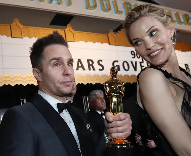 Actor Sam Rockwell winner of the Best Supporting Actor award for “Three Billboards Outside Ebbing, Missouri” and Leslie Bibb attend the 90th Annual Academy Awards Governors Ball at Hollywood & Highland Center on March 4, 2018 in Hollywood, California. (Photo by Mario Anzuoni/Reuters)