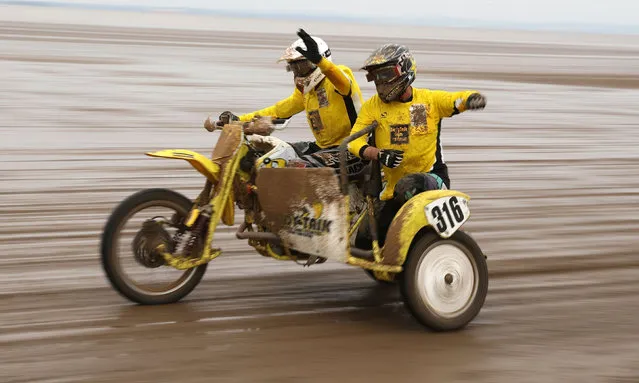 David Gray and Les Mudie in the Quad and Sidecar Race  at the 2016 HydroGarden Weston Beach Race in Weston- super- Mare, south west England, on October 8, 2016. (Photo by Andrew Matthews/PA Wire)