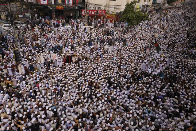Thousands of Bangladeshi Muslims protesting the French president’s support of secular laws allowing caricatures of the Prophet Muhammad march to lay siege on the French Embassy in Dhaka, Bangladesh, Monday, November 2, 2020. (Photo by Mahmud Hossain Opu/AP Photo)