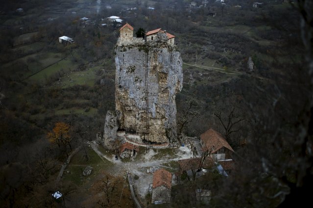 A church is seen on top of the Katskhi Pillar, a rock mass about 40 meters high, in the village of Katskhi, Georgia, November 27, 2015. (Photo by David Mdzinarishvili/Reuters)