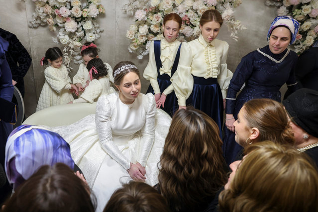 Chaya Nechama Glanz (C), the great-granddaughter of Grand Rabbi Aron Teitelbaum, greets her guests before her marriage ceremony in the Brooklyn borough of New York, New York, USA, 04 December 2025. The Satmar Hasidic community, led by Grand Rabbi Aron Teitelbaum, is known for its strict adherence to traditional Jewish law and its theological opposition to the modern State of Israel. (Photo by Sarah Yenesel/EPA)