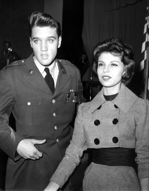 Rock'n Roll star Elvis Presley is welcomed by Nancy Sinatra at the airport of Fort Dix, N.J. on March 3, 1960. The famous singer has returned to the USA after finishing his military service in Germany. (Photo by AP Photo)