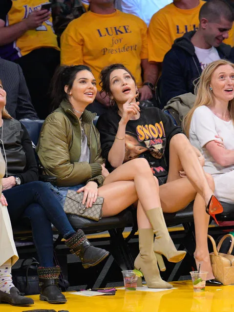 Kendall Jenner (L) and Bella Hadid attend a basketball game between the Dallas Mavericks and the Los Angeles Lakers at Staples Center on November 8, 2016 in Los Angeles, California. (Photo by Noel Vasquez/GC Images)