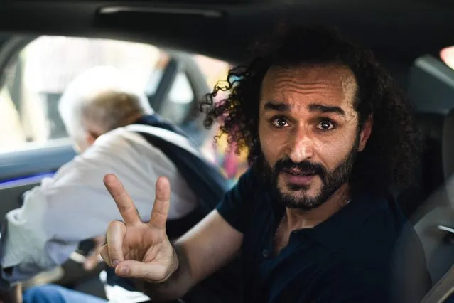 Egyptian activist Ahmed Douma, a leading figure in the country's 2011 uprising who has spent the last decade behind bars, gestures following his release from prison on August 19, 2023. (Photo by AFP Photo/Stringer)