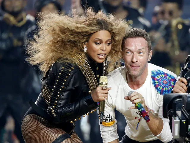 Beyonce and Chris Martin of Coldplay perform during the half-time show at the NFL's Super Bowl 50 between the Carolina Panthers and the Denver Broncos in Santa Clara, California February 7, 2016. (Photo by Lucy Nicholson/Reuters)
