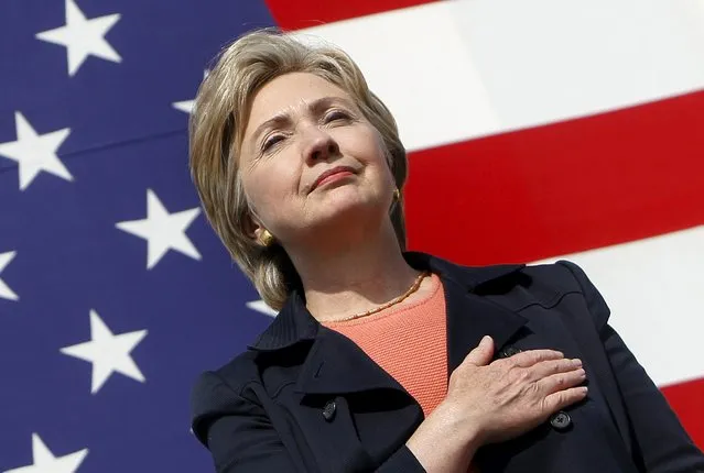 U.S. Senator Hillary Clinton (D-NY) places her hand over her heart during the National Anthem at the 30th annual Harkin Steak Fry in Indianola, Iowa, in this September 16, 2007 file photo. (Photo by /Joshua Lott/Reuters)