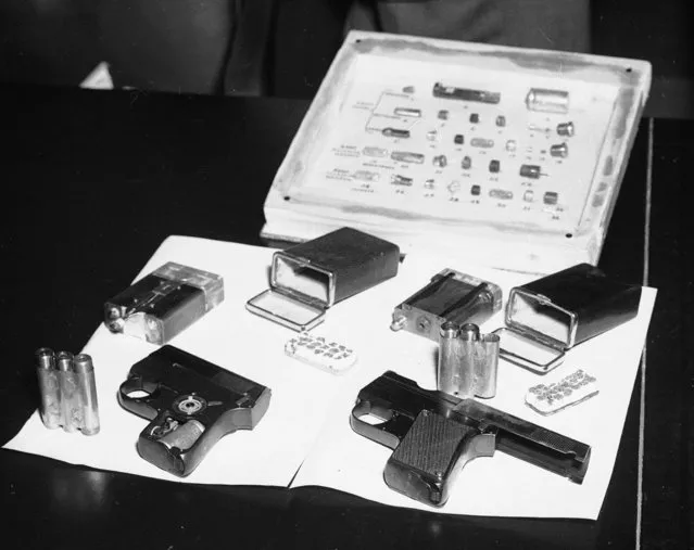 Two miniature pistols and two deadly cigarette cases, developed in the Soviet Union secret police, fell into western hands after the defection of Russian intelligence Capt. Nikolai E. Khokhlov, who was instructed to used them in the assassination of Sergeyevich Okolovich, a member of the anti-Soviet organization NTS in Frankfurt, Germany, 1954. (AP Photo/Albert Gillhausen)