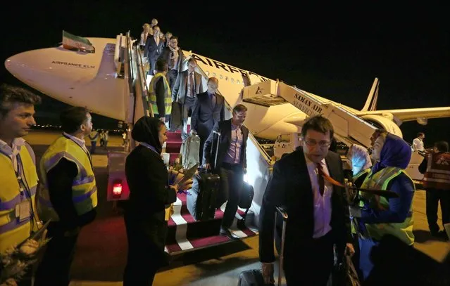 A French business delegation disembarks from the Air France plane after landing at the Imam Khomeini international airport, in Tehran, Iran, 17 April 2016. Media reported that this is the first Air France flight to land in Tehran after the resumption of  Air France resumed flights to Tehran in eight years, following the nuclear deal between Iran and world powers. (Photo by Abedin Taherkenareh/EPA)