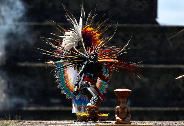 A performer is seen during the new fire ceremony for the Pan American Games Lima 2019 in Teotihuacan, Mexico on July 2, 2019. (Photo by Gustavo Graf/Reuters)