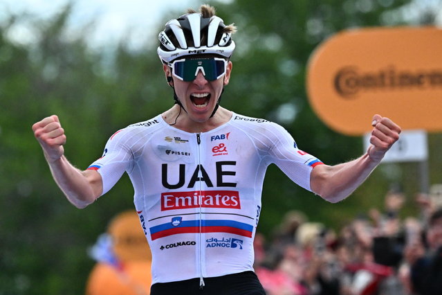 Slovenian rider Tadej Pogacar of Uae Team Emirates celebrates after crossing the finish line to win the second stage of the Giro d'Italia 2024, a 161km cycling race from San Francesco al Campo to Santuario di Oropa (Biella), Italy, 05 May 2024. (Photo by Luca Zennaro/EPA)