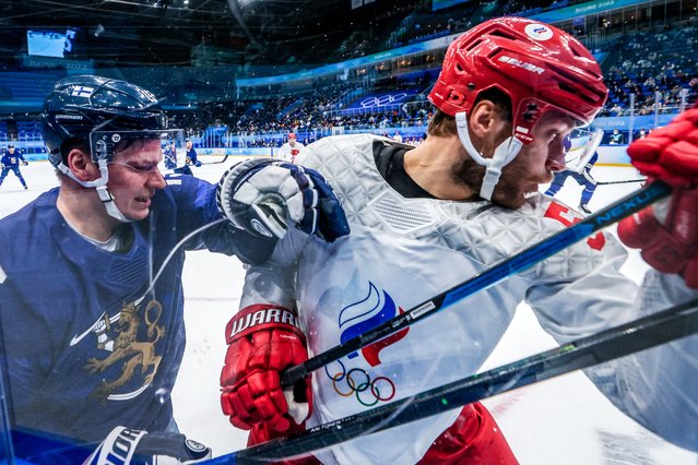 Finland’s Miro Aaltonen (L) and Team ROC's Vladimir Tkachev in their men's ice hockey gold medal game at the 2022 Winter Olympic Games, at the National Indoor Stadium in Beijing, China on February 20, 2022. (Photo by Sergei Bobylev/TASS)