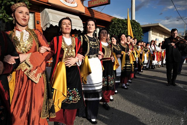 Greek folk dance performance groups dance during the Opening Ceremony of the European Capital of Culture 2023 in Elefsina, Greece on February 4, 2023. (Photo by Menelaos Myrillas/SOOC via AFP Photo)