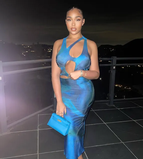 American socialite and model Jordyn Woods says she wishes “time never mattered” in a revealing blue dress in early March 2022. (Photo by jordynwoods/Instagram)