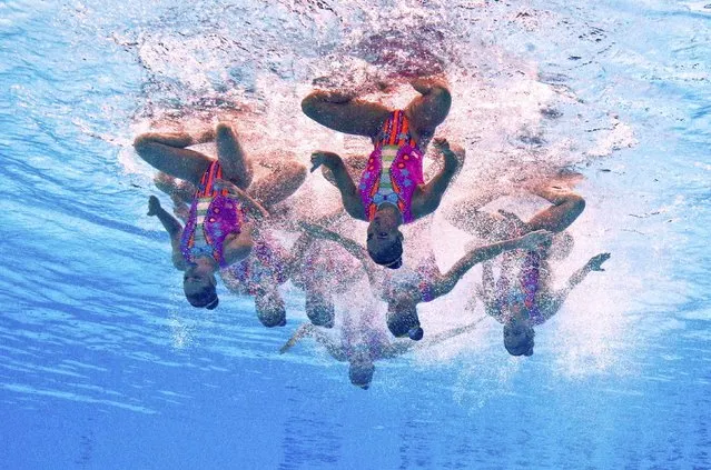 Members of Team Mexico are seen underwater as they perform in the synchronised swimming team free routine preliminary at the Aquatics World Championships in Kazan, Russia July 28, 2015. (Photo by Michael Dalder/Reuters)