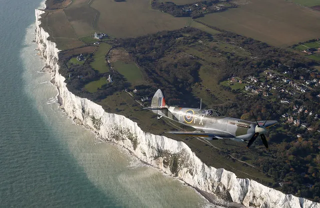 World War II Supermarine Spitfire fighter performs a flyover over White Cliffs of Dover during Remembrance Sunday celebrations in Dover, Britain, November 10, 2019. (Photo by Henry Nicholls/Reuters)