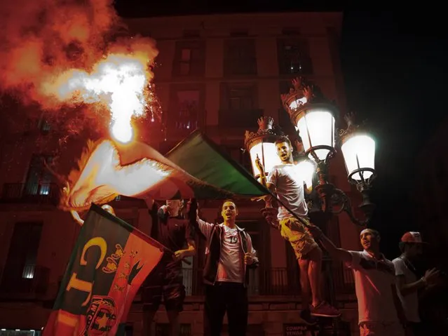 Spain: Algerian fans celebrate their victory over Russia. (Photo by Myriam Meloni)
