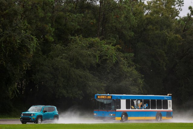 A bus rides near Walt Disney World as Hurricane Milton approaches, in Orlando, Florida on October 9, 2024. (Photo by Jose Luis Gonzalez/Reuters)