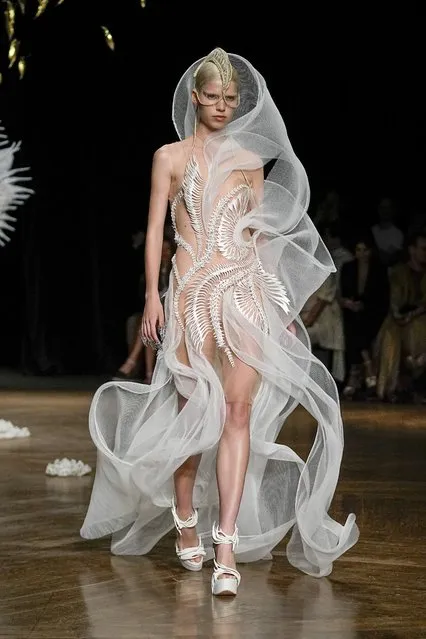 A model wears a creation as part of Iris van Herpen Haute Couture Fall/Winter 2022-2023 fashion collection presented Monday, July 4, 2022 in Paris. (Photo by Michel Euler/AP Photo)