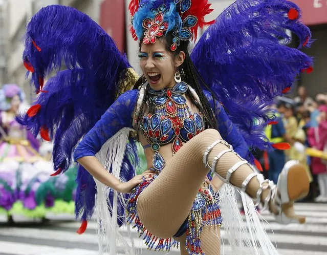 A Japanese samba dancer performs during the 34th annual Asakusa Samba Carnival in Tokyo August 29, 2015. About 5,000 people participated in the annual samba carnival on Saturday. (Photo by Toru Hanai/Reuters)