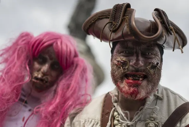 A man dressed as a zombie participates in a walk for World Zombie Day 2017 on Place de la Republique in Paris, France, 07 October 2017. (Photo by Ian Langsdon/EPA/EFE)