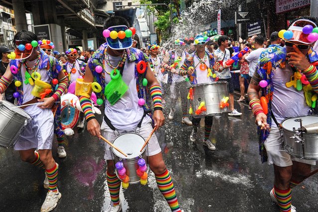 Performers take part in the Amazing Bangkok Songkran Parade to mark the annual Songkran festival, also known as the water festival, the traditional Thai New Year celebrations, at Silom Road in Bangkok, Thailand, on April 14, 2025. (Photo by Anusak Laowilas/NurPhoto/Rex Features/Shutterstock)