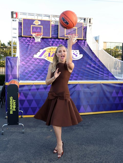 American actress Kate Hudson attempts to hit one off the backboard at an LA screening of her Netflix show “The Running Point” in the first decade of June 2025. (Photo by katehudson/Instagram)