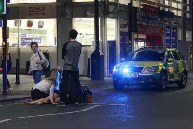 An ambulance is called to tend to someone who may have had too much to drink on a night out from Liverpool University in Liverpool, United Kingdom on September 21, 2016. (Photo by Paul Jacobs/FameFlynet UK)