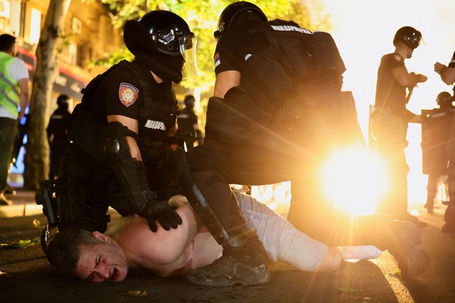 Law enforcement officers detain an injured demonstrator, during an anti-government protest demanding snap elections, in Belgrade, Serbia, on June 28, 2025. (Photo by Marko Djurica/Reuters)